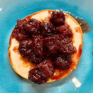 Cherry compote on pancakes